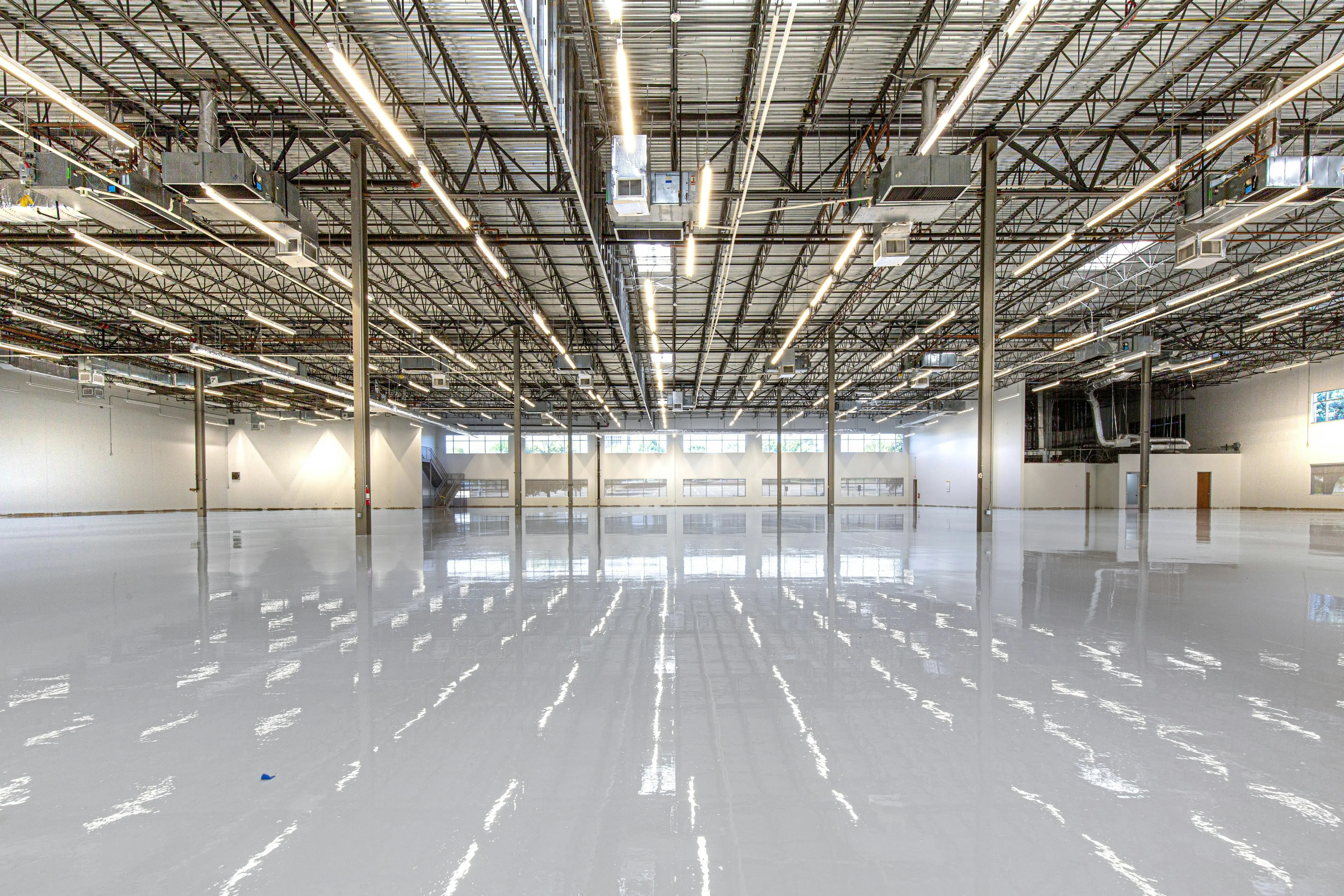 Metallic epoxy flooring with pearl swirl effect